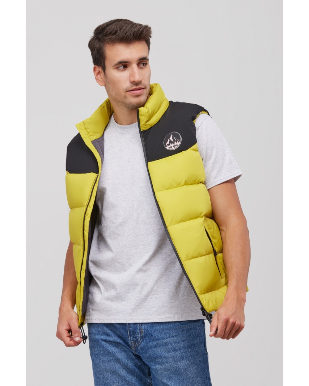 Roc Neige SÜOL chaleco plumas unisex amarillo y negro